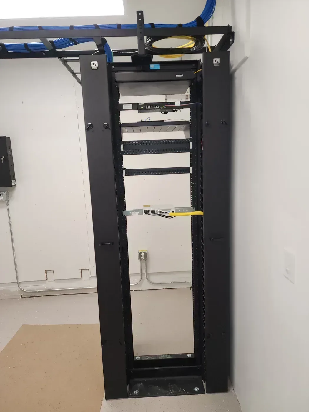 Completed network rack front view in Fort Myers architectural consulting office renovation