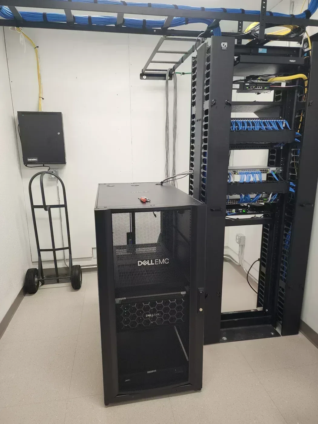 Rack-mounted network equipment in completed architectural consulting firm installation
