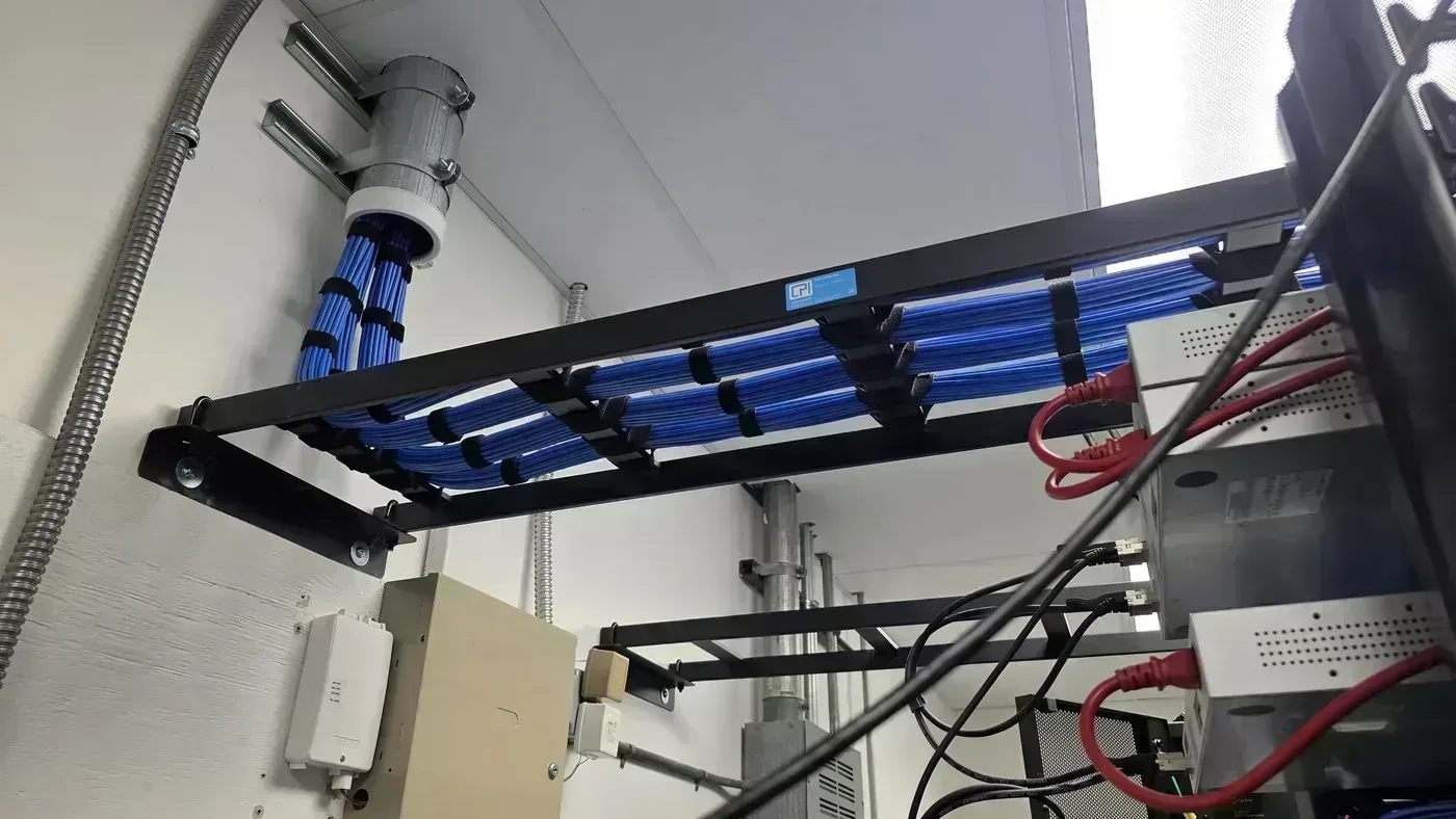 Cat6 cable routing on ladder rack in active research laboratory