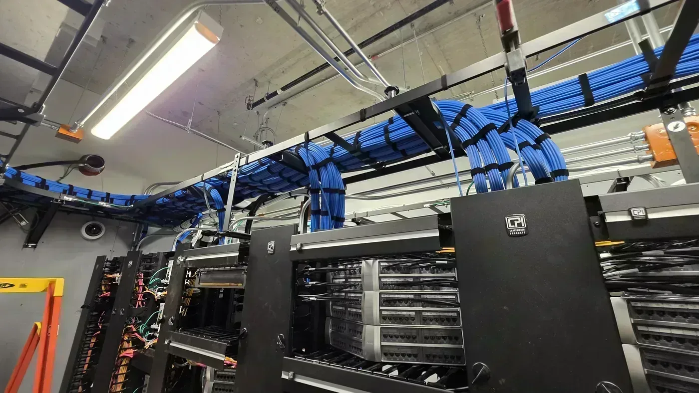Dressed Cat6A bundles on ladder rack in hospital floor TDR