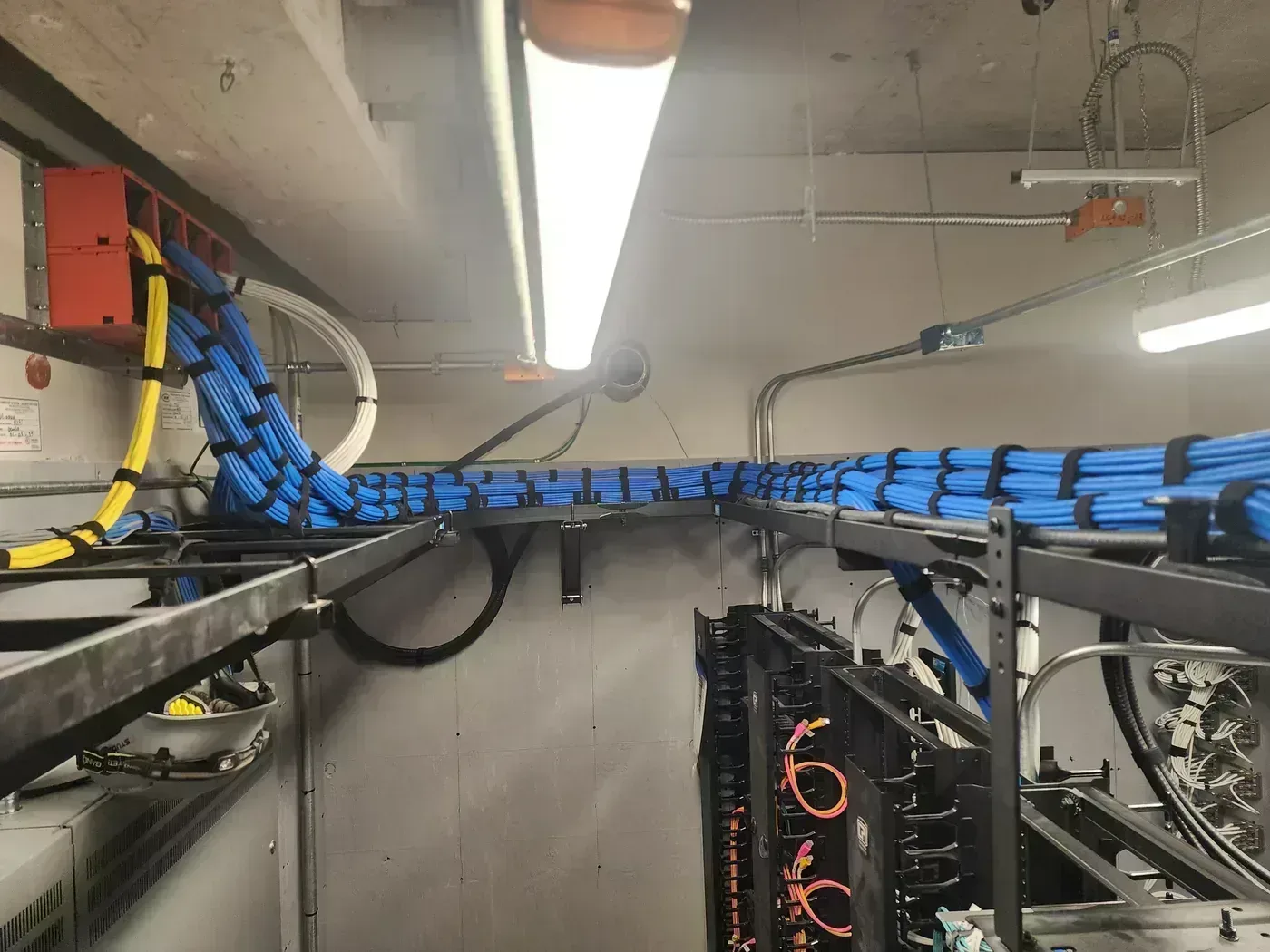 Fire sleeves and Cat6A cable bundles in hospital floor renovation