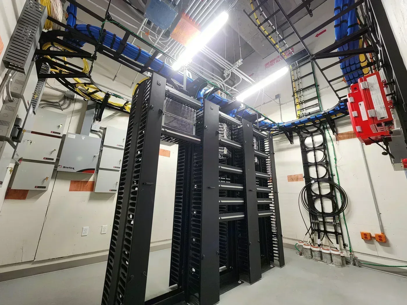 Medical Office Building TDR server room with organized Cat6A structured cabling